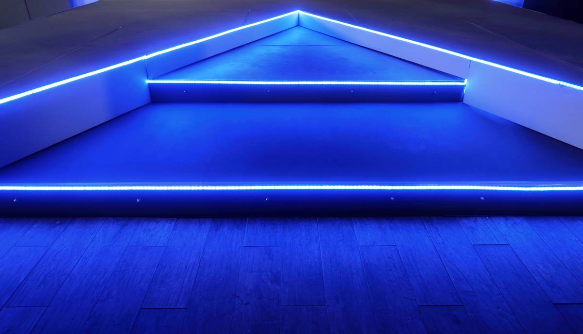 Before: flickering, uneven LED strip in basement. After: smooth, warm cove lighting using Home Depot Canada kit